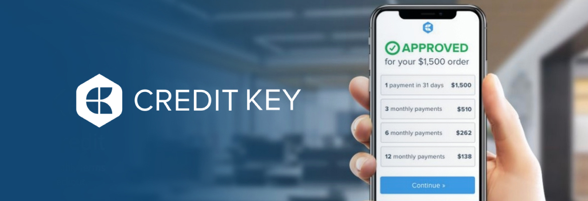 Credit Key Banner with Logo and Hand Holding Mobile Phone on Credit Key Webpage